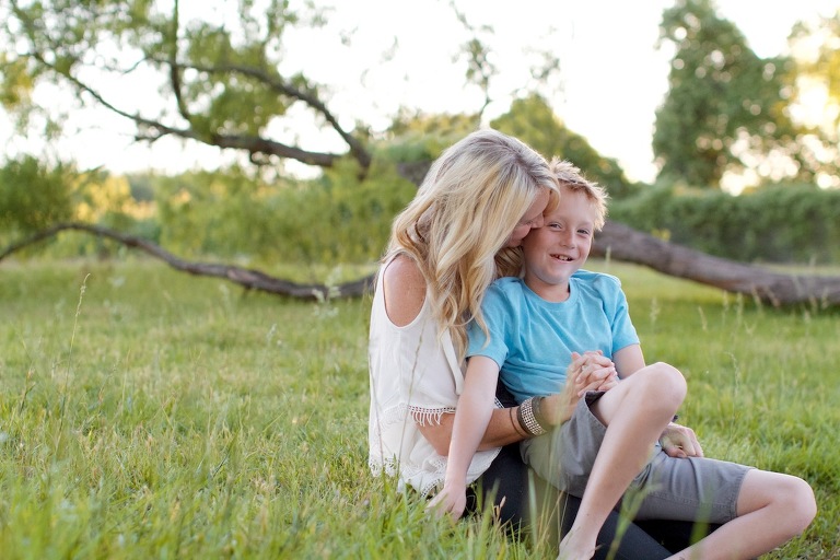 Mom giving hugs to son
