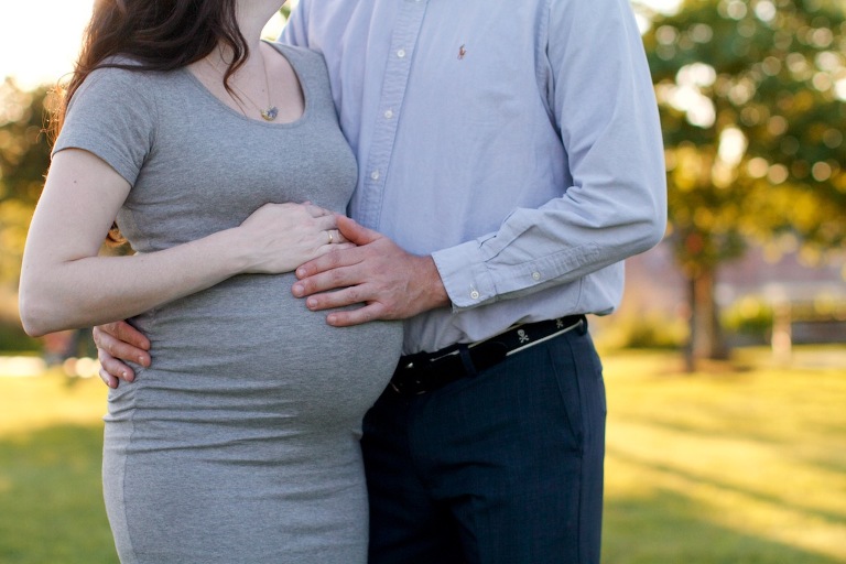 Maternity photo with husband and wife