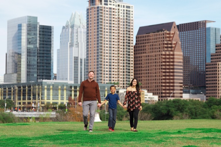 Family photo in downtown austin with skyline
