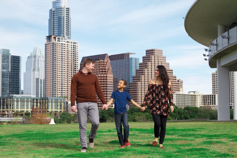Family photo in downtown Austin walking