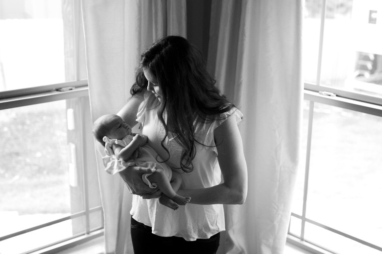 Mom holding newborn baby
