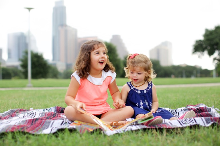 Sisters reading together