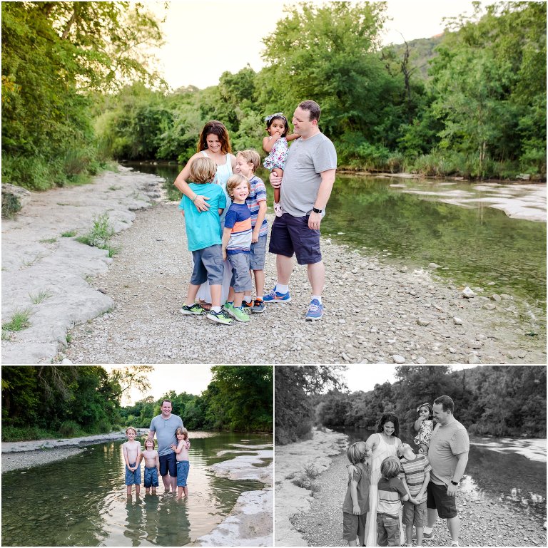 Family hugging each other by a stream