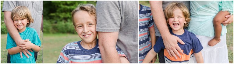 All smiles of children close to their dad